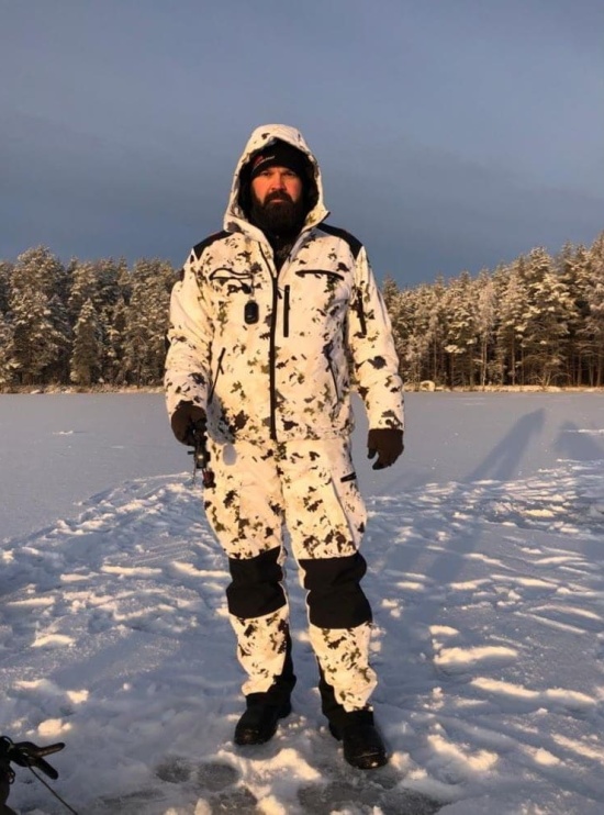 Naruska snow camo hunting jacket in the winter on a hunter