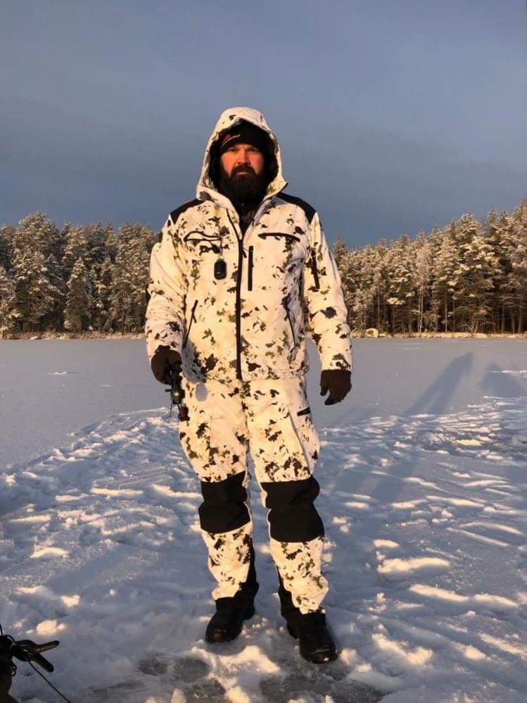 Naruska snow camo hunting jacket in the winter on a hunter