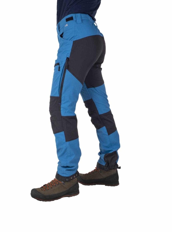 Nokko Blue outdoor trousers for men shown from the side on the model