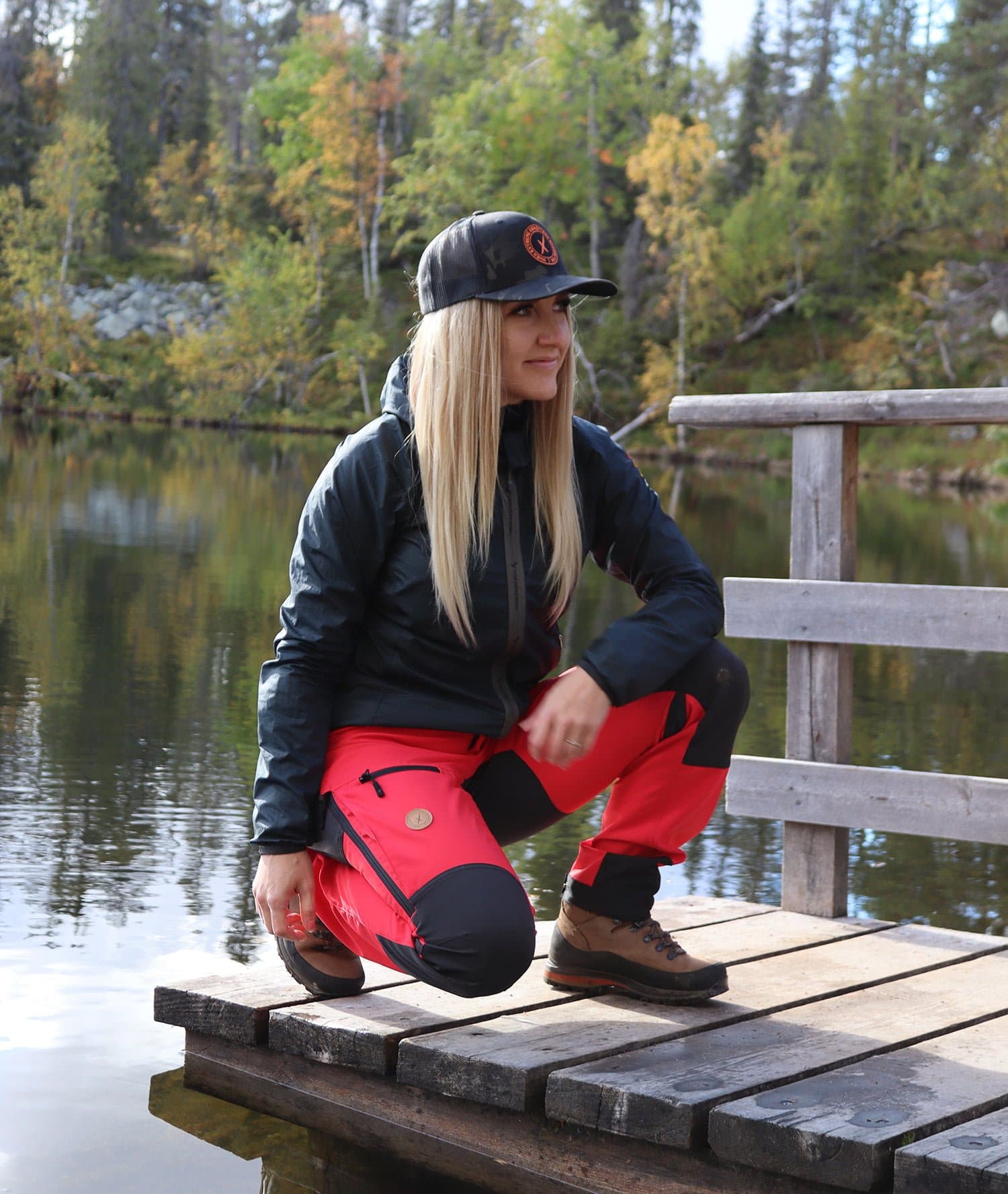 Red outdoor pants for women on model