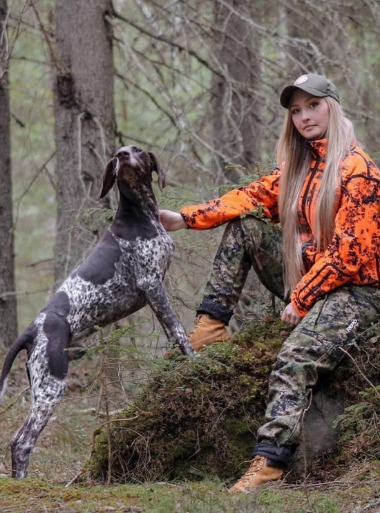 Repo Extreme Karelia Dark xFade hunting suit on female model in the forest