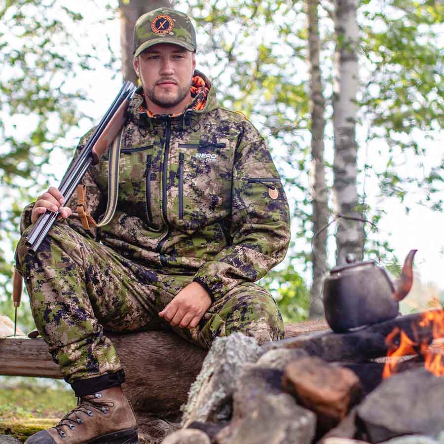 Karelia Dark xFade hunting trousers by the campfire