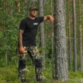 Nokko Camo men's outdoor trousers in the forest on a model