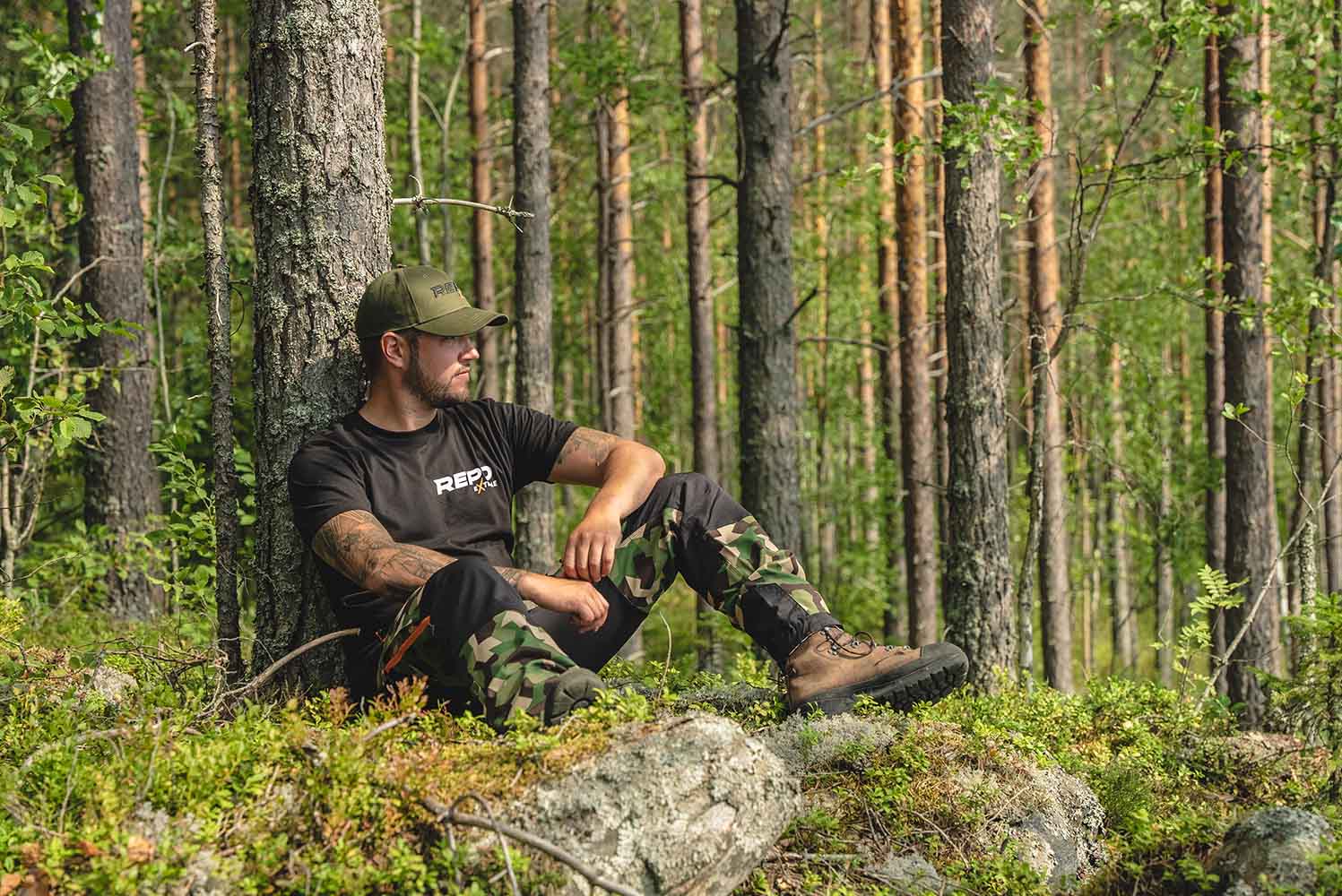 Cap with Repo Extreme embroidered logo and Nokko Camo outdoor trousers